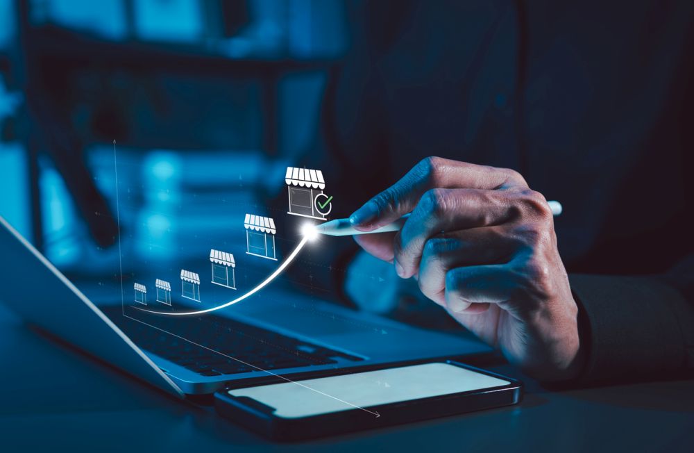 Franchise concept. Franchise Business Growth and Expansion Strategy Visualization. Entrepreneur visualizing franchise growth trajectory with increasing store icons on a digital upward trend graph
