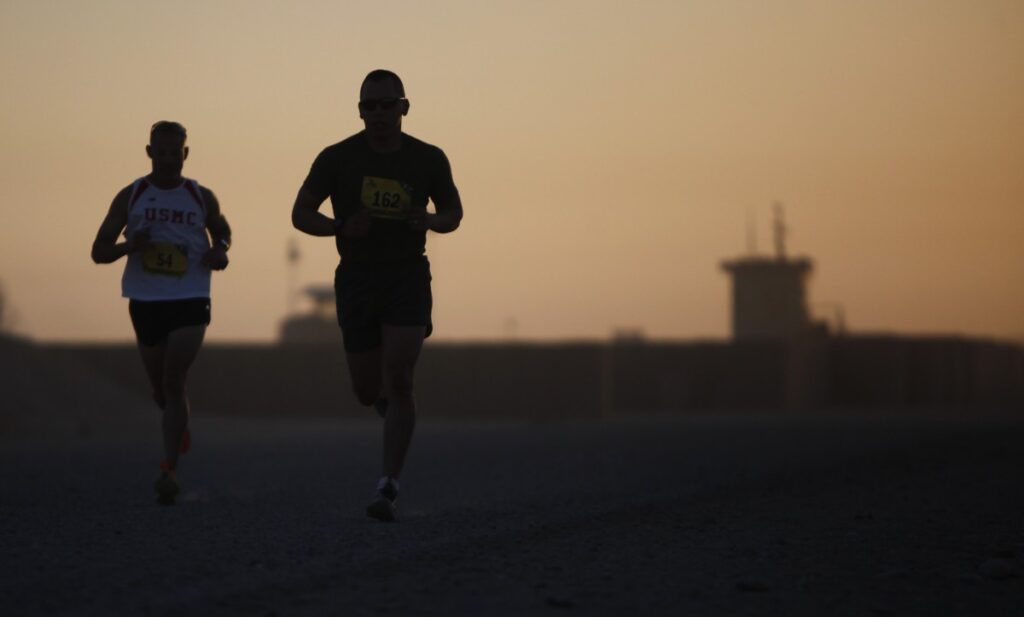two persons running