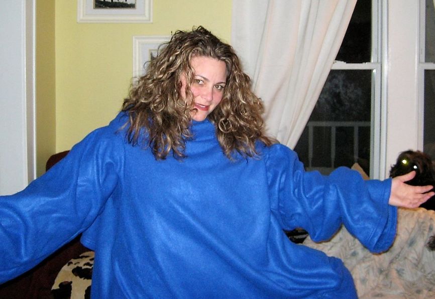 a woman wearing a blue Snuggie