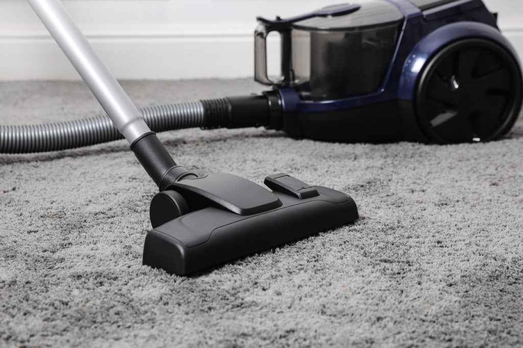 a-black-and-blue-vacuum-cleaner