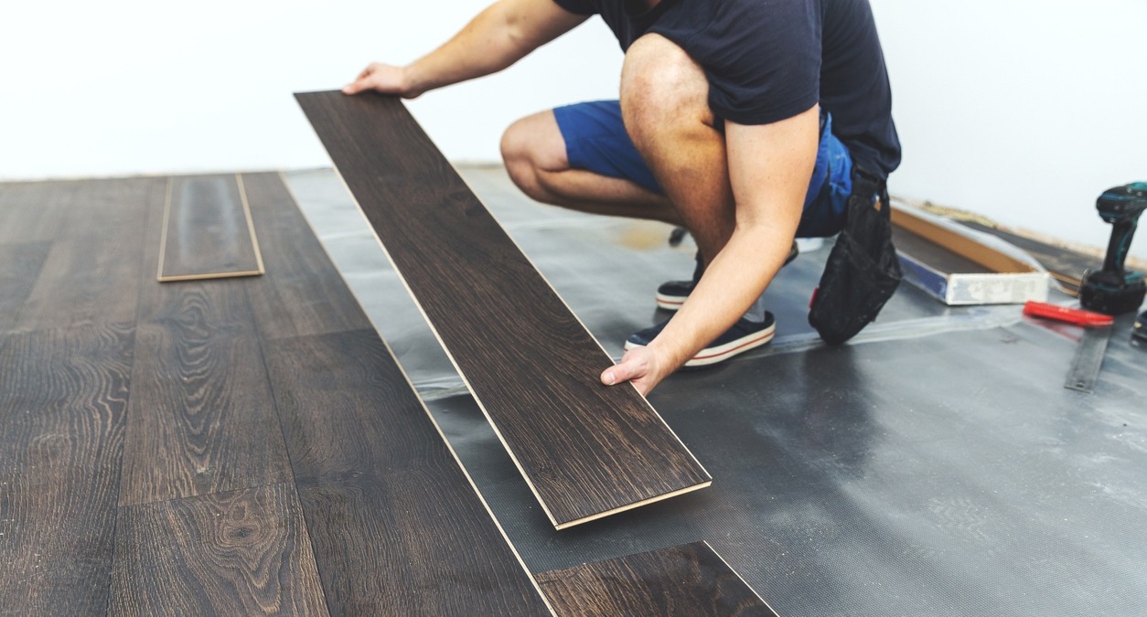 person-installing-a-laminate-flooring
